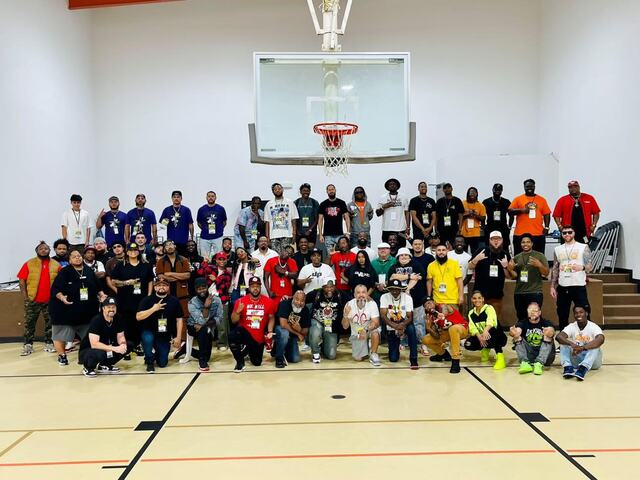 CHH Austin group photo on a basketball court